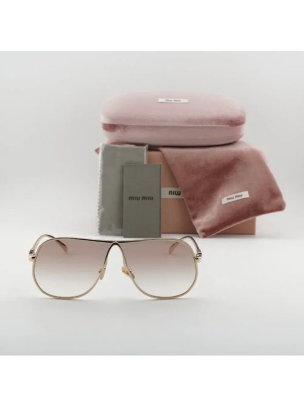 Miu Miu MUA56S 5AK90L Geometric Sunglasses – Gold/Brown Gradient
